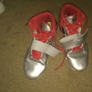 Youth boys size 8 Cam Newton Under Armour cleats.